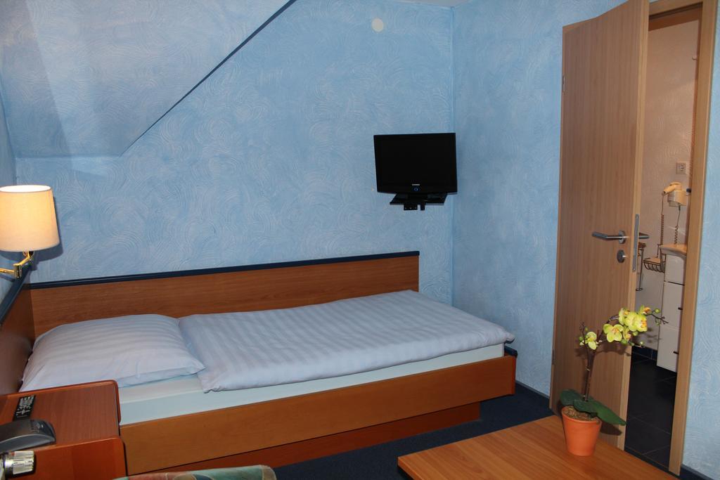 Hotel Rosenhof Дюссельдорф Номер фото
